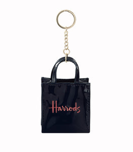 Mini Navy Logo Shopper Bag Harrods Keyring.. سلسلة مفاتيح بشكل حقيبة تسوق صغيرة باللون الأزرق البحري