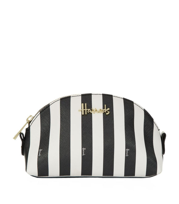 Boutique Black and White Multi Stripe Cosmetic Bag...حقيبة مستحضرات تجميل  متعددة الخطوط باللونين الأبيض والأسود