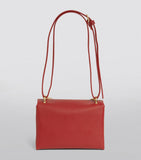 London Charms Red Cross Body Bag.  حقيبة باللون الأحمر من لندن تشارمز