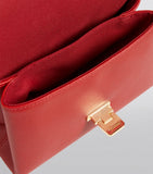London Charms Red Cross Body Bag.  حقيبة باللون الأحمر من لندن تشارمز