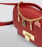 London Charms Red Cross Body Bag.  حقيبة باللون الأحمر من لندن تشارمز