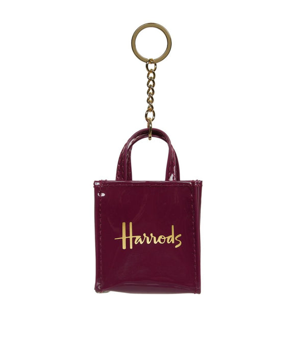Mini Burgundy Logo Shopper Bag Harrods Keyring...سلسلة مفاتيح بشكل حقيبة تسوق صغيرة باللون العنابي
