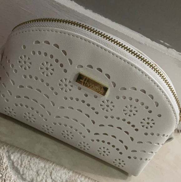 Cutwork White Cosmetic Bag...حقيبة مستحضرات تجميل بيضاء
