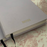 Harrods A5 Lilac Linen Notebook..دفتر هارودز من الكتان البنفسجي